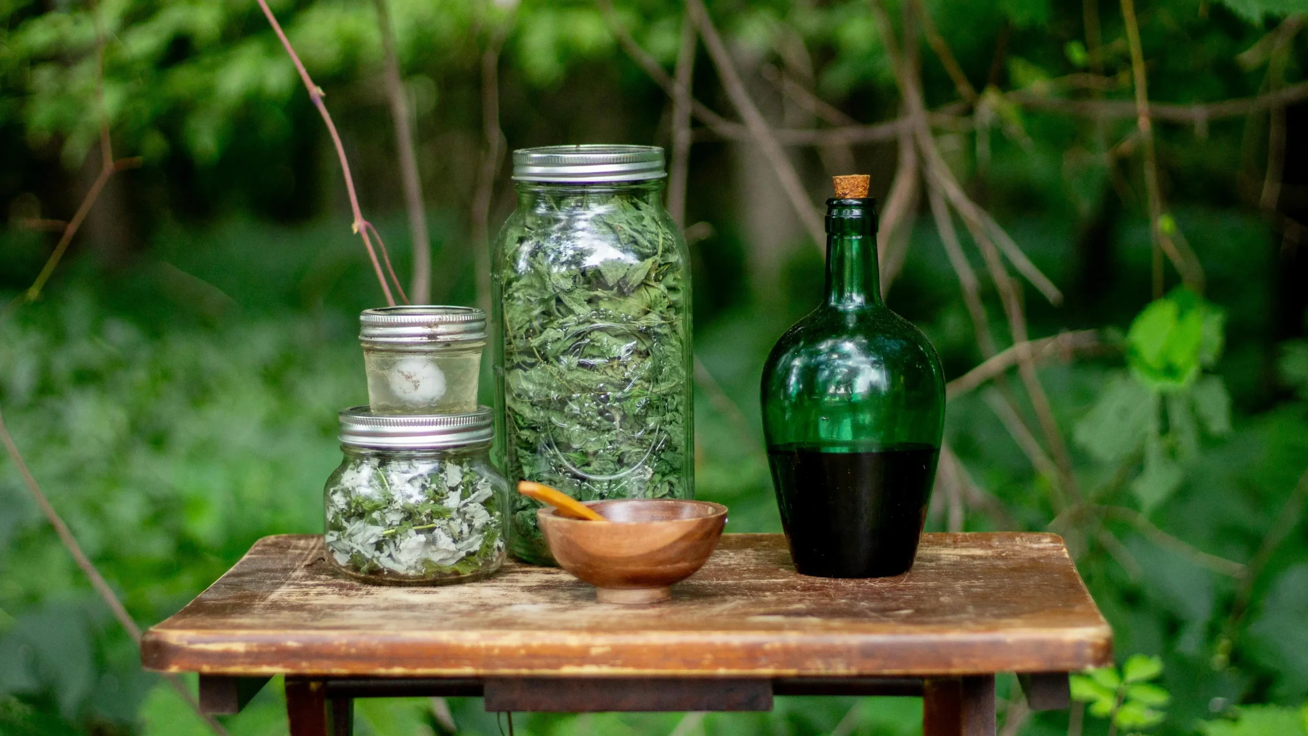 Herbs and oils in jars, a natural solution for yeast infections.