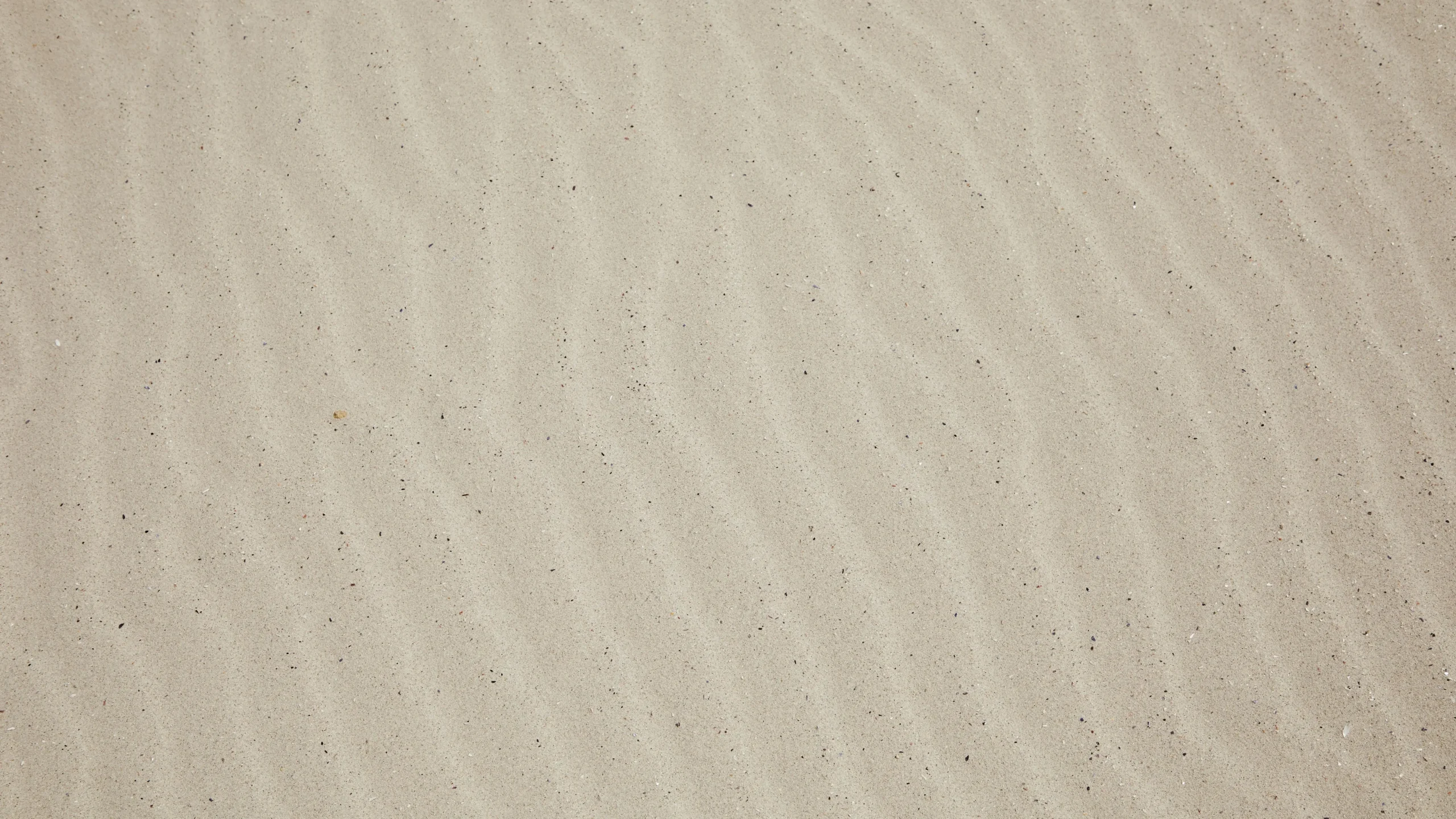 Dry beach sand representing sudden dryness issue.