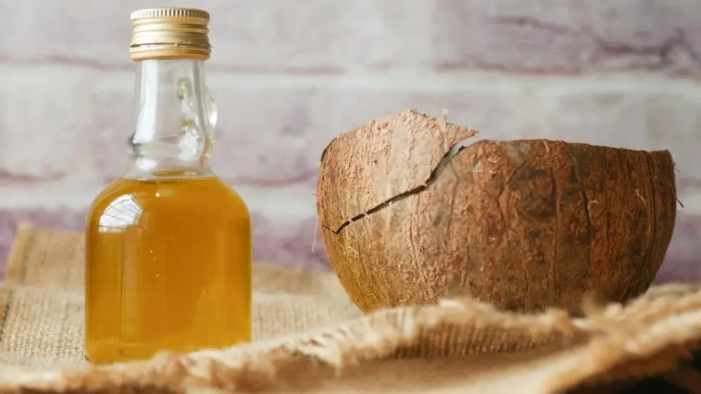 Coconut oil bottle and coconut shell for vaginal dryness