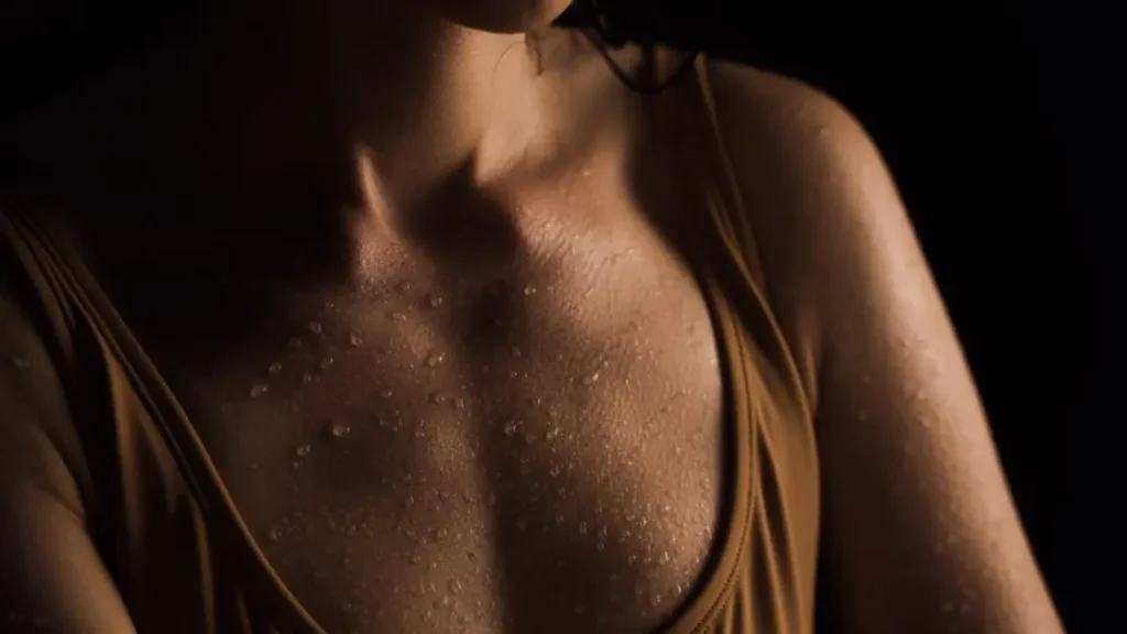 Sweat causing skin rash on woman's chest