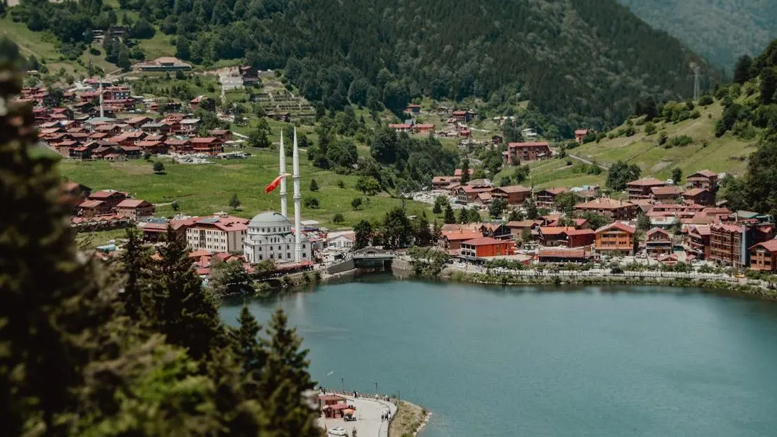 Small town by mountains and water reflecting on causes of mood swings