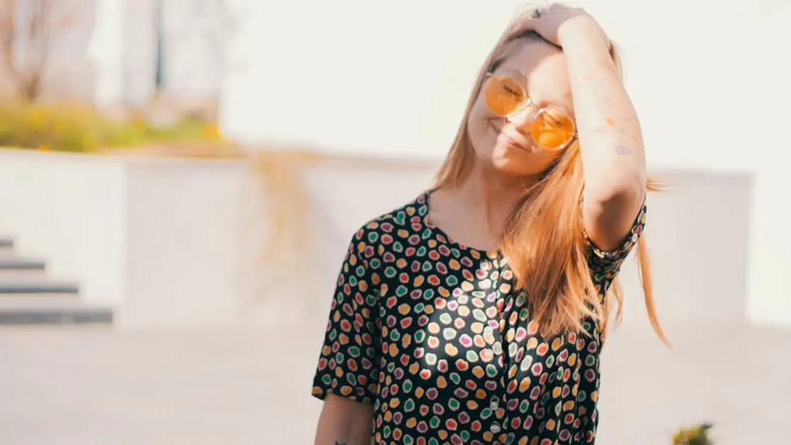 Woman enjoying sunlight, representing benefits of Estrogen Therapy for menopause.