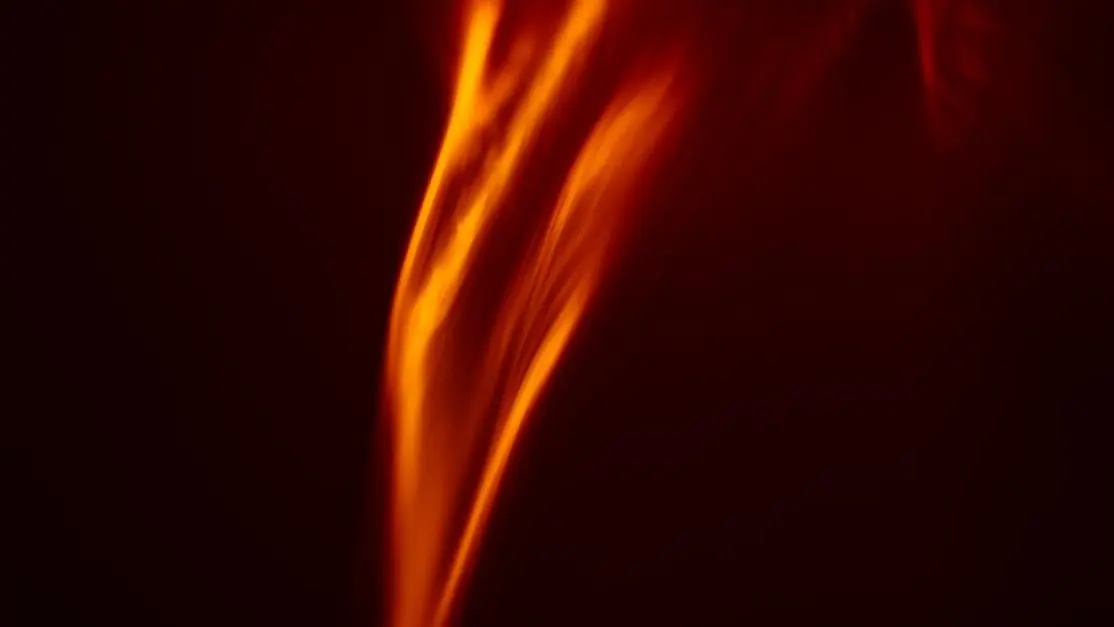 Red and yellow abstract flames representing hot flash symptoms.