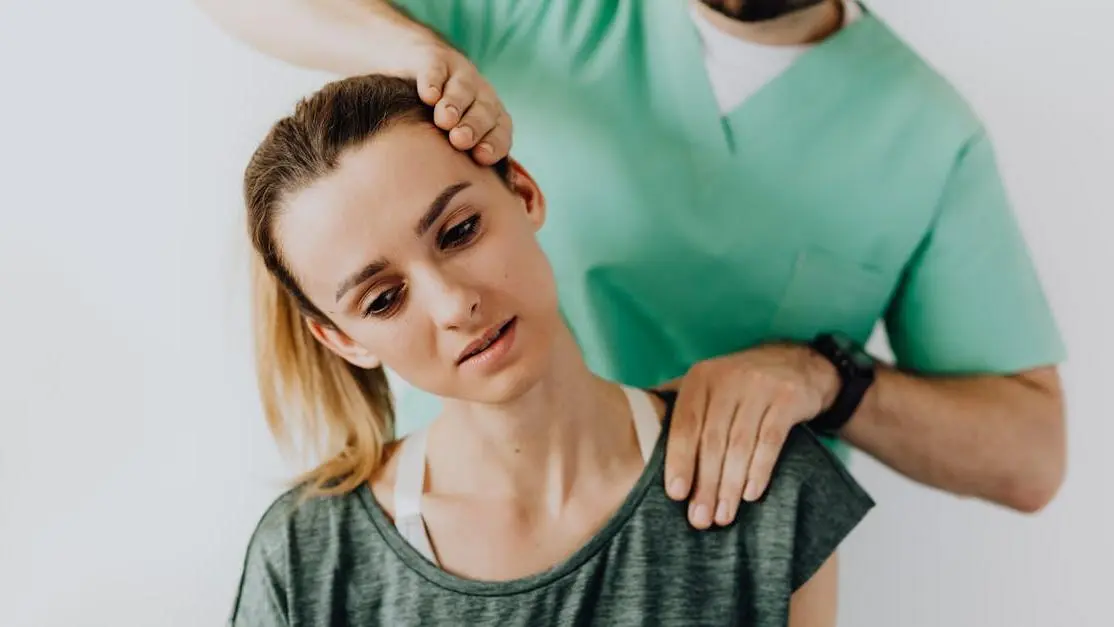 Therapist massaging woman's neck and shoulders for hot flashes semaglutide therapy