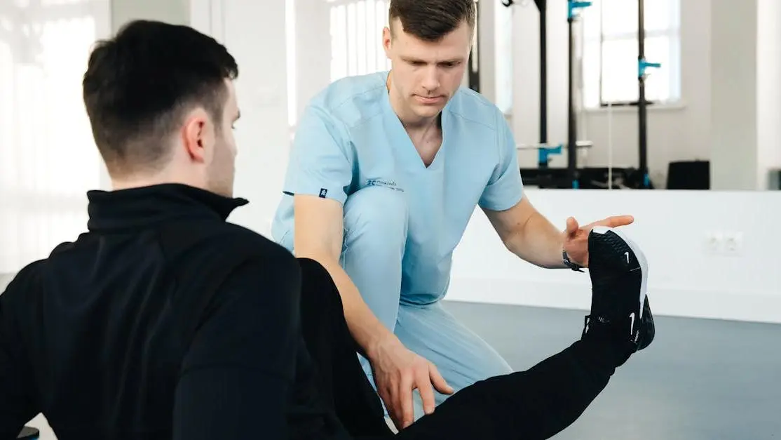 Doctor Examining Patient's Leg - Importance of Regular Medical Check-Ups in Preventing BV