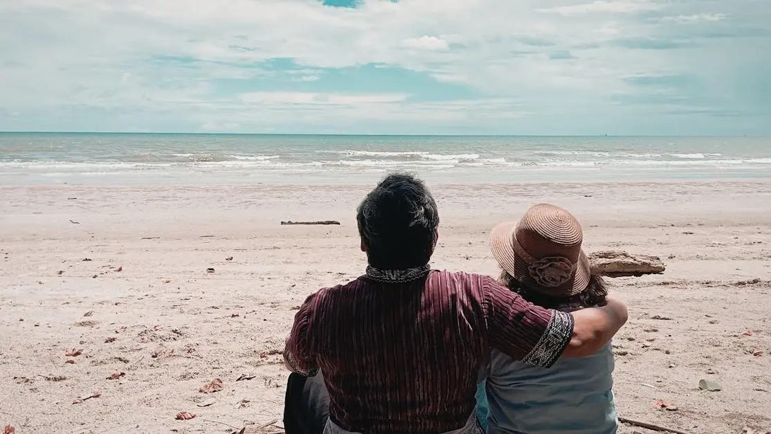 Couple Sitting on the Shore Discussing Menopause Extreme Mood Swings