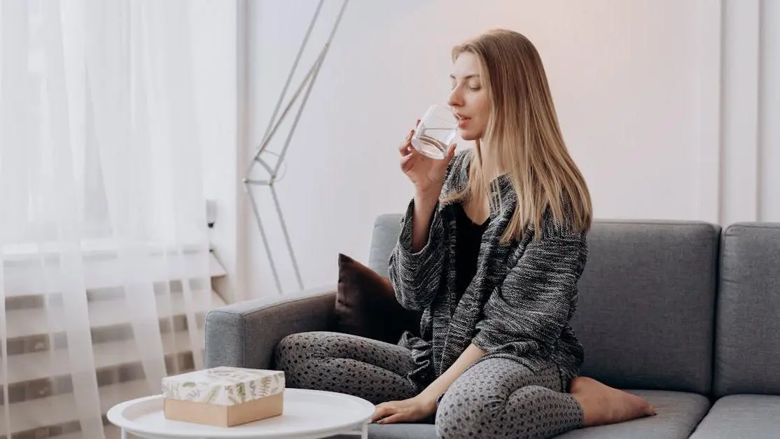 Woman staying hydrated during menopause