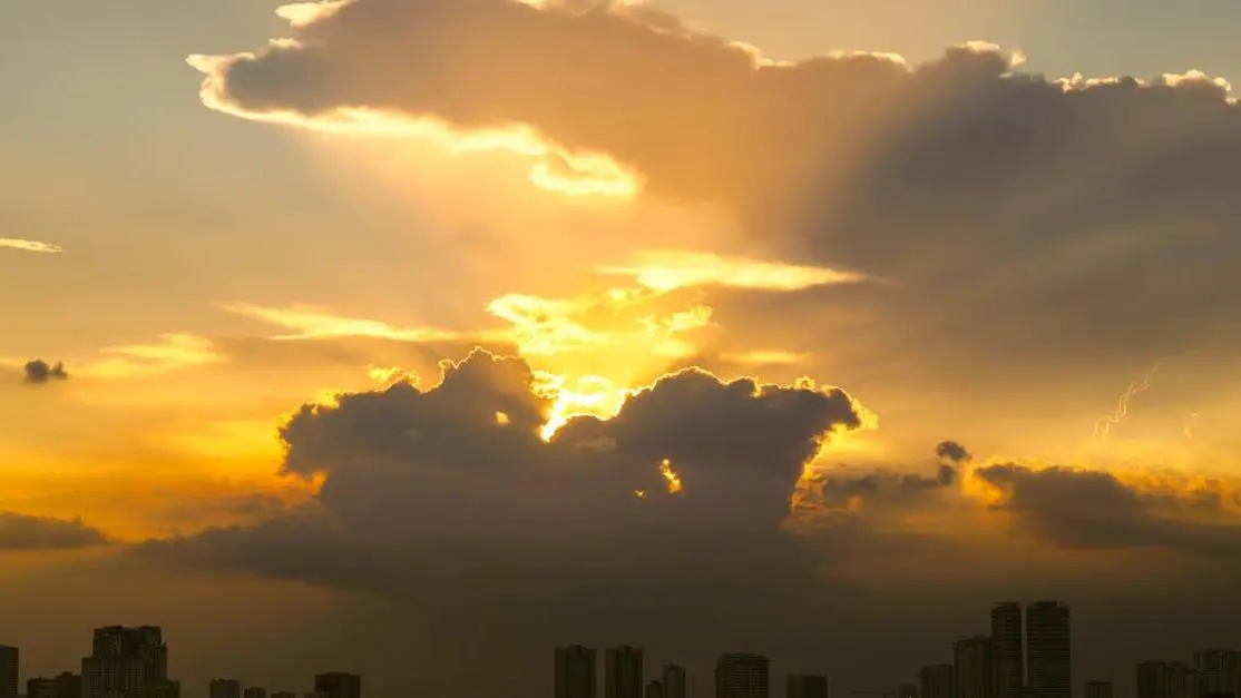 Sunset over water, reflecting mood swings and emotional changes in the sky