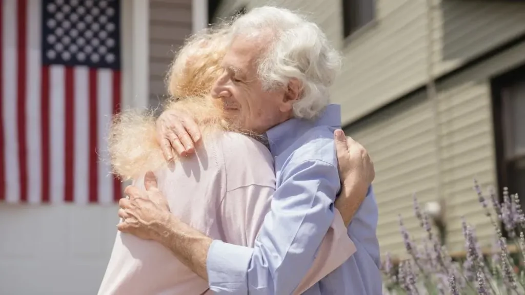 Affectionate elderly couple debunking the myth that menopause ends your sex life