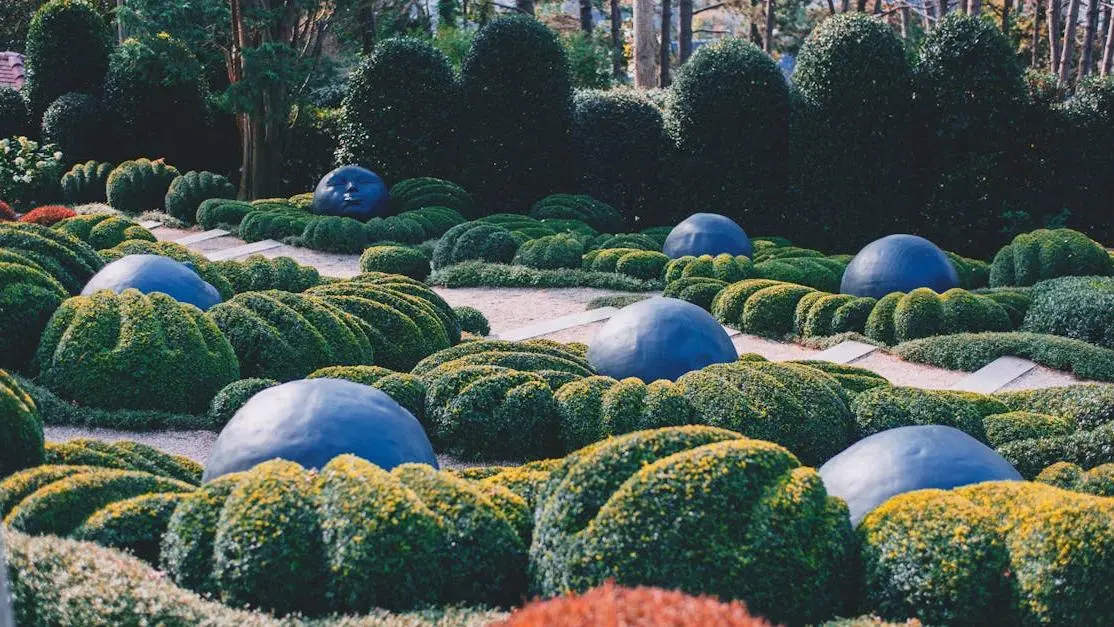 Etretat garden sculpture symbolizing postmenopausal mood swings, sunny summer day in France