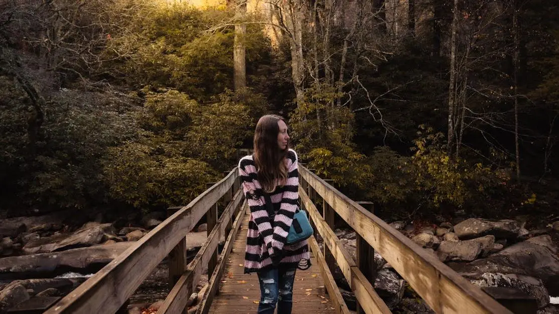 Woman in autumn forest, golden light, showcasing Best GLP-1 Program for Women.